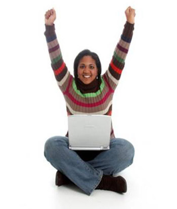 woman sitting with both hands raised up in the air
