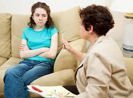 Attorney talking with a young girl